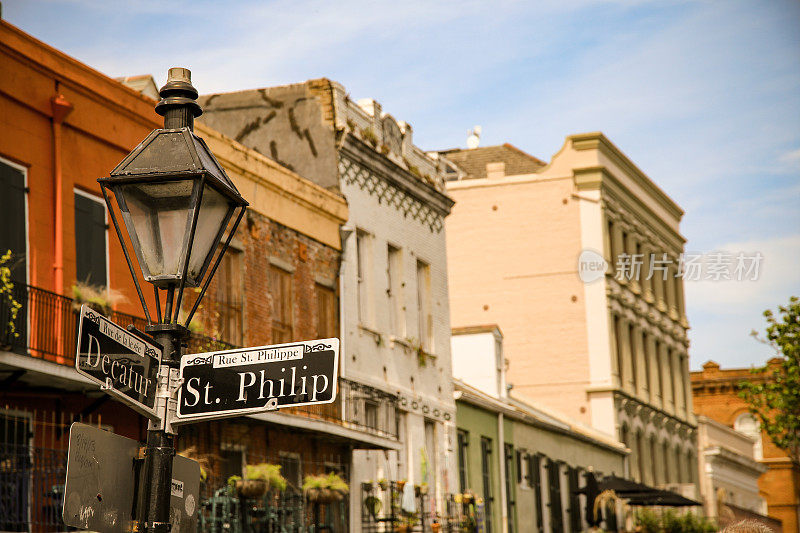 New Orleans French Quarter Colorful Facades, Decatur, St. Philip Street Sign on Streetlight